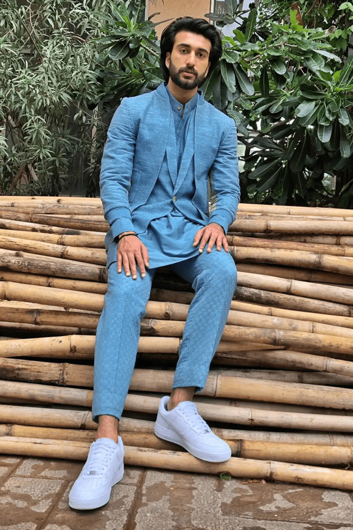 Meezan In Blue jacket with short blue kurta and trousers